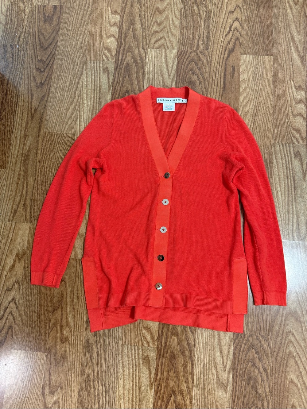 Gretchen Scott orange cardigan with gross grain trim and gold buttons size M.